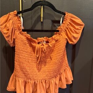 BCBGeneration Vibrant Orange Smocked Blouse